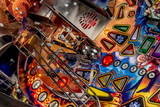 Fliper Stern Iron Maiden pinball machine playfield with colorful artwork and vibrant LED features.