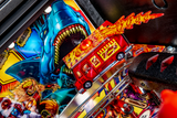 Fliper Stern Deadpool game with vibrant artwork and a flaming red toy van in action.