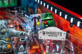 Fliper Stern The Walking Dead Remastered Limited Edition pinball machine close-up showing Woodbury and zombie features.